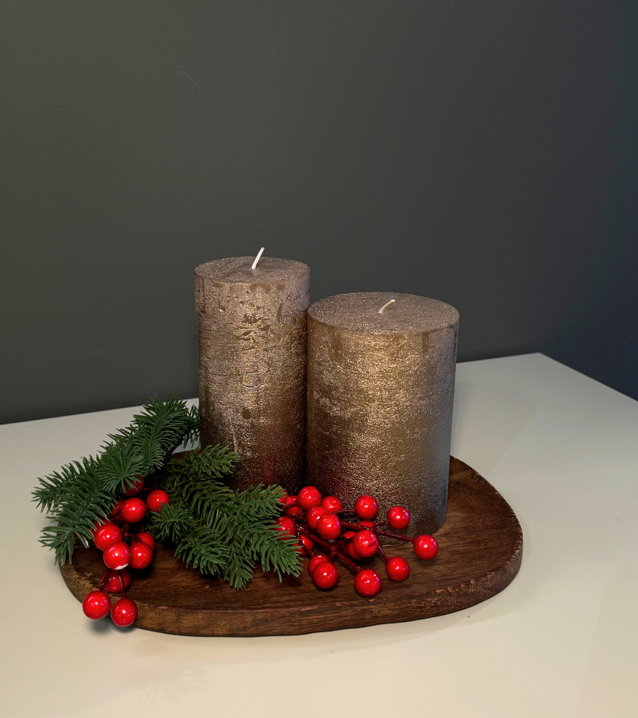 candela bronzo e piatto organico in legno